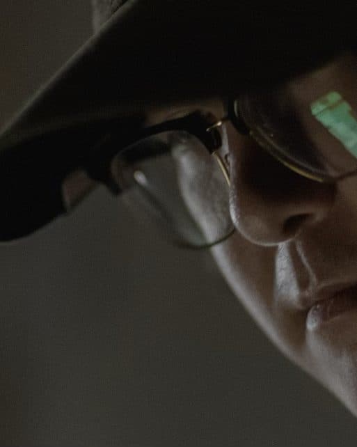 A Team Rubicon volunteer in glasses, close up.