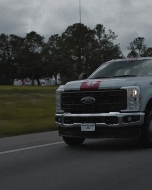 A Team Rubicon truck on the road.