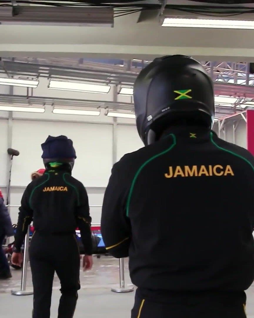 The Jamaican team in a hangar.
