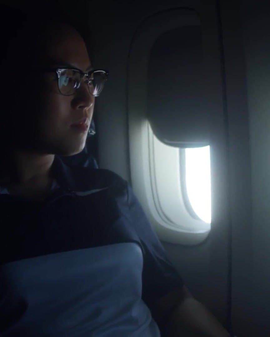 Sojung Shin by a plane window.