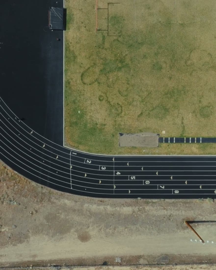 A running track seen from directly overhead.