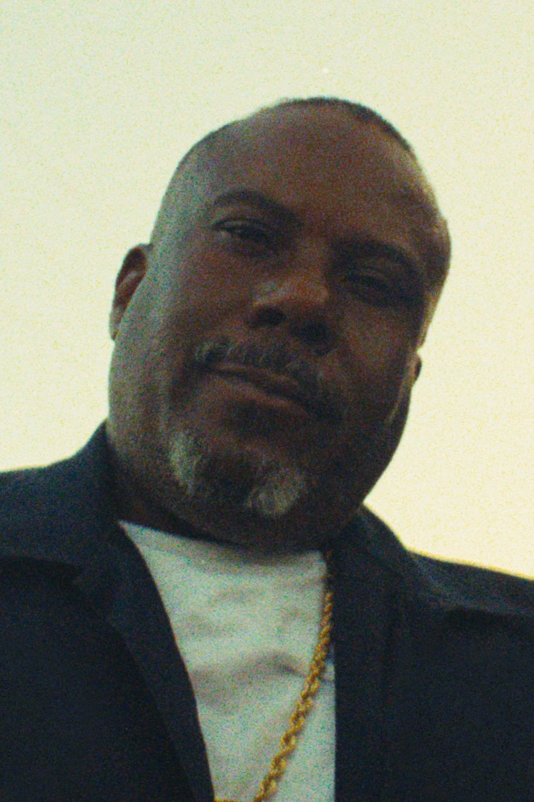 A member of the Dallas lowrider club in golden light.