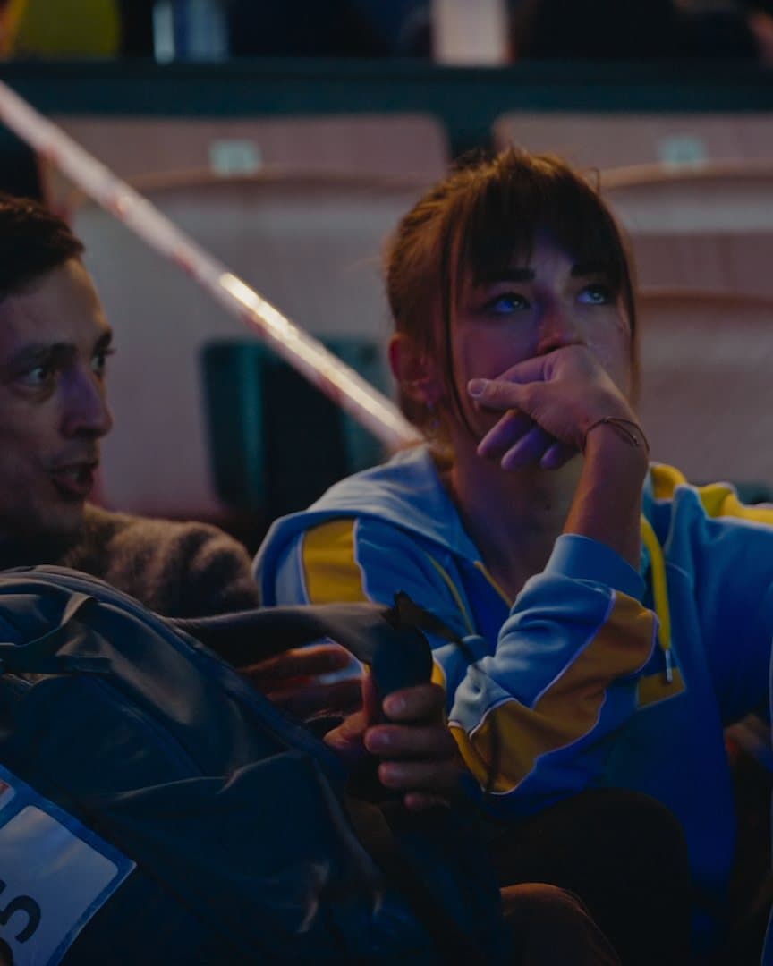 Teammates comforting each other after a round.