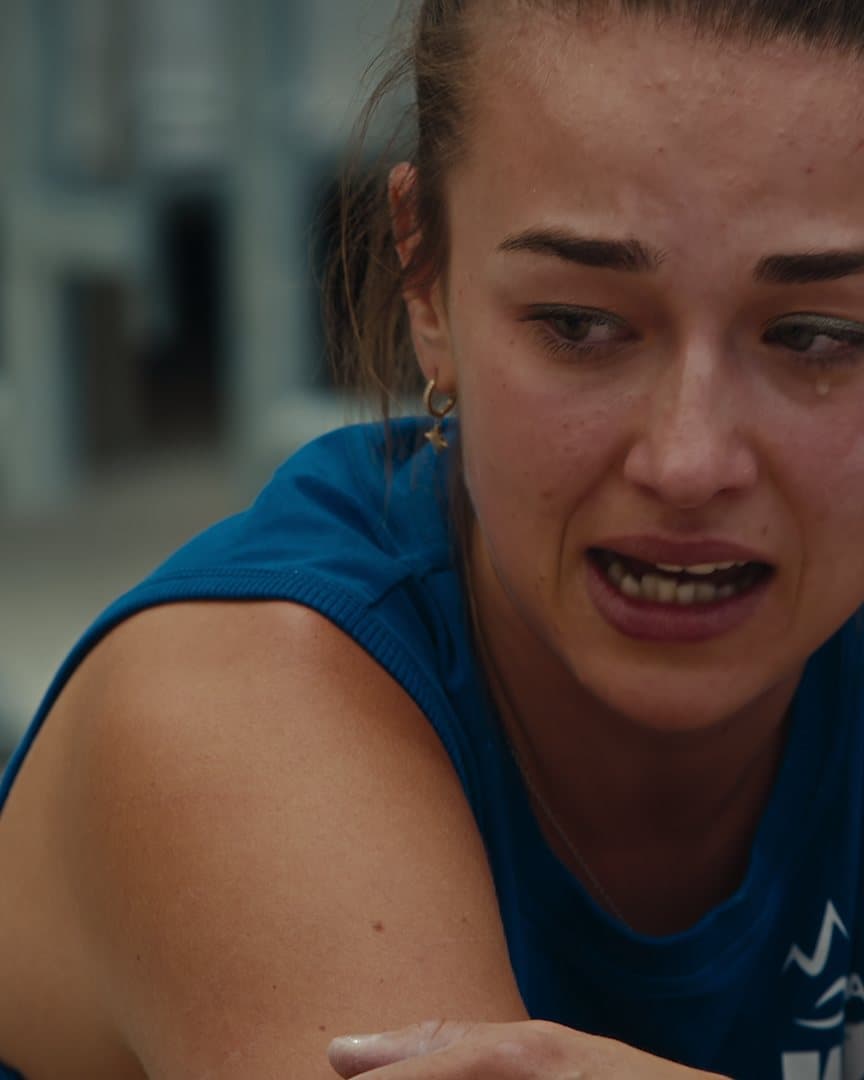 A climber close to tears after her attempt.