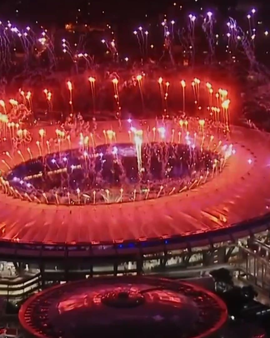 Fireworks over an Olympic stadium, from the archive.