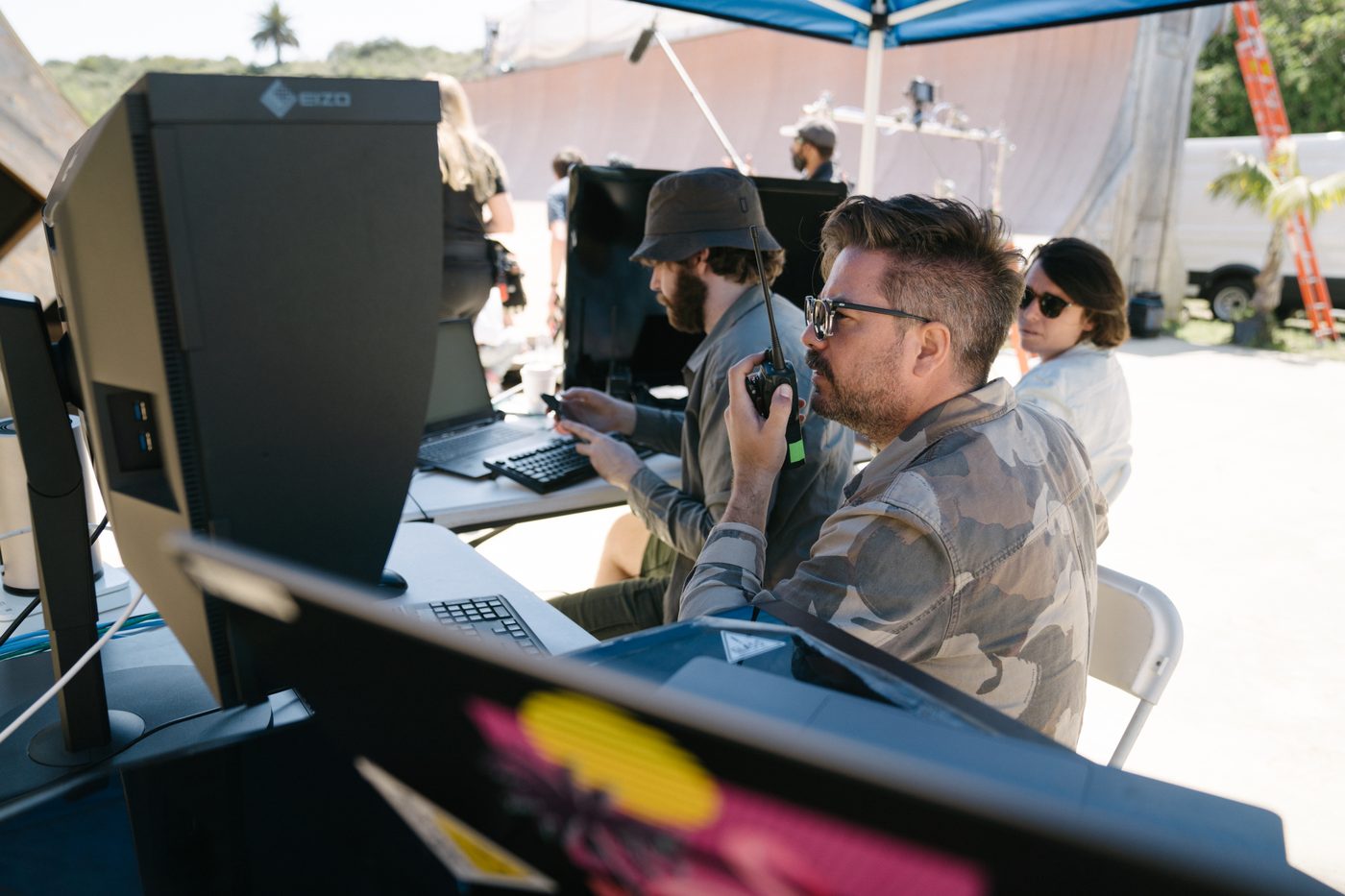 Reviewing footage on monitors in the tent