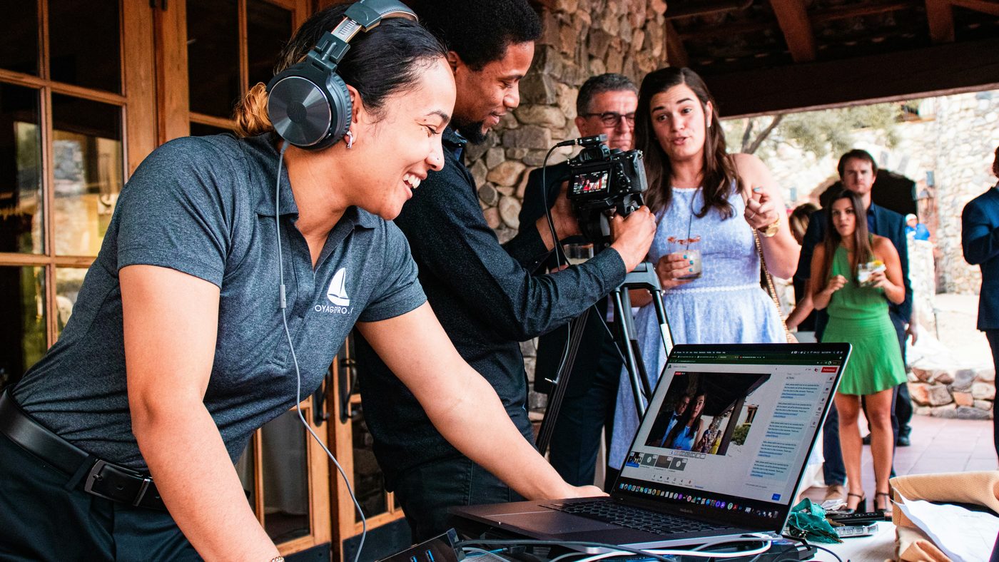 Reviewing a take on a laptop on set